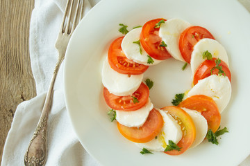 Plate with caprese salad top view