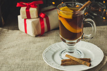 Gluhwine in glass and Christmas presents