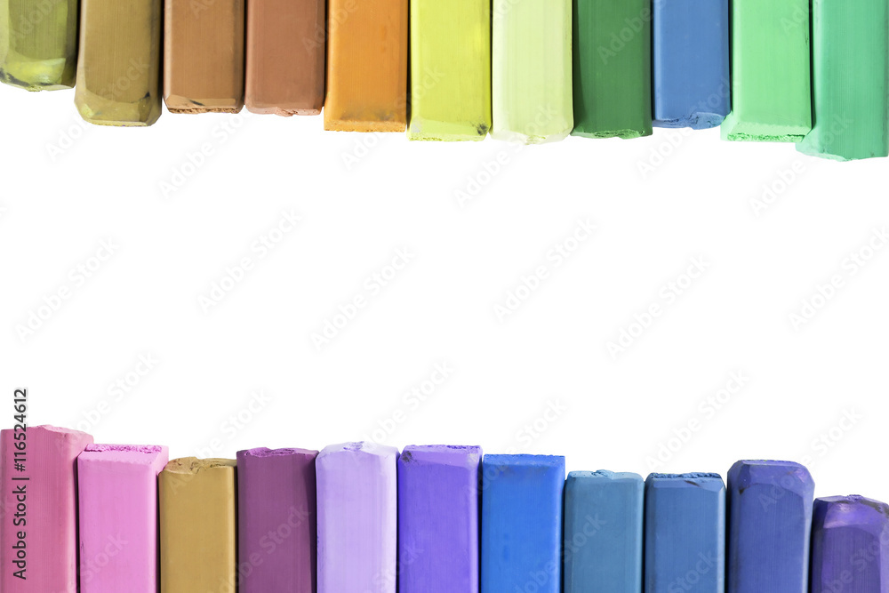 Wall mural Colorful crayons isolated