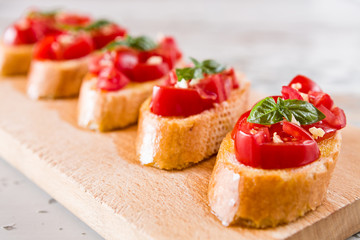 Closeup of Italian bruschetta with tomato, basil and garlic