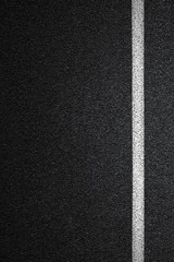 Fototapeta premium Level asphalted road with a dividing white stripes. The texture of the tarmac, top view.