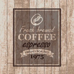 sign for a cafe with coffee grains on a background of retro wooden planks
