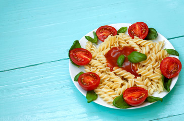 Plate of pasta with cherry tomatoes