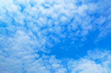 Fototapeta na wymiar Clouds against blue sky, bright blue sky backdrop.For art textur