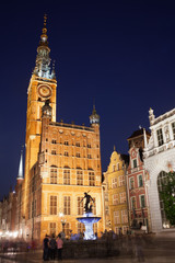Fototapeta na wymiar Gdansk Town Hall and Neptune Fountain by Night