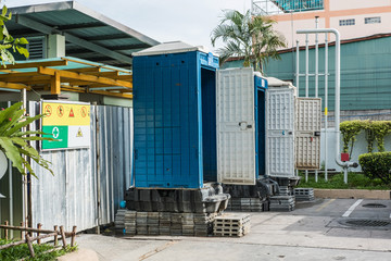 Fototapeta na wymiar Temporary movable toilets at gas station, using while the toilet is in maintainance