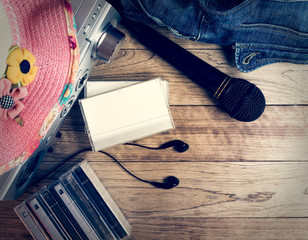Set of audio device on wooden background