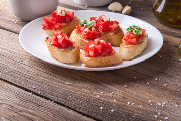 Bruschetta with tomato, onion and basil