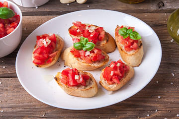 Bruschetta with tomato, onion and basil