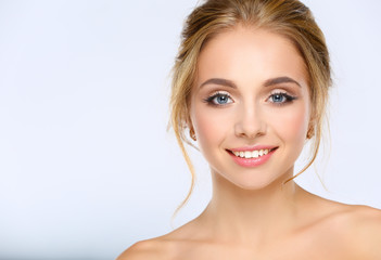 Fototapeta premium Portrait of beautiful woman on white background