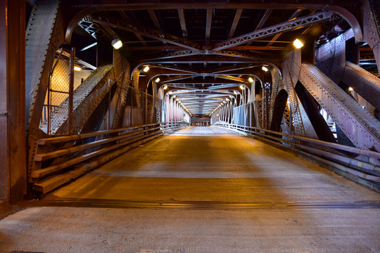 Fototapeta Underground industrial urban bridge over water 