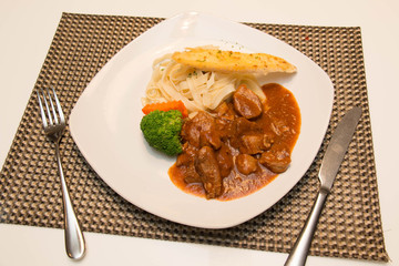 Pork stew with pasta
