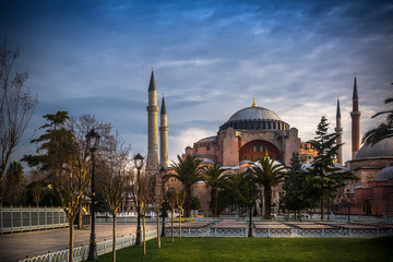 Fototapeta na wymiar Hagia Sophia church , mosque and now museum in Istanbul Turkey exterior view at sunset view from the park of Sultanahmet mosque