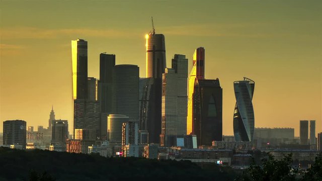 Timelapse of a sunset reflecting on the Moscow City downtown, Russia, July 2016