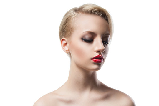 Beautiful young model with blonde short hair and red lips