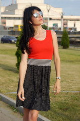 Beautiful girl posing on city streets