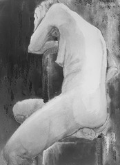 Naked woman on a chair in black and white. The dabbing technique near the edges gives a soft focus effect due to the altered surface roughness of the paper.