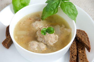 buckwheat soup meatballs white plate