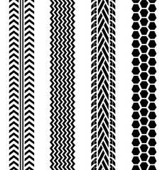 Black tire tracks set on white background