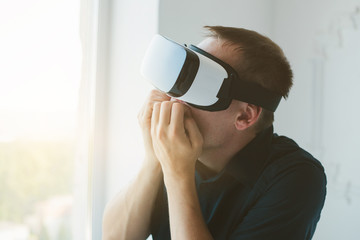 The man with glasses of virtual reality. Future technology concept.