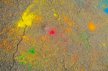 The texture of the asphalt. Dry paint. Multi-colored stains, splashes and traces of paint dry.
