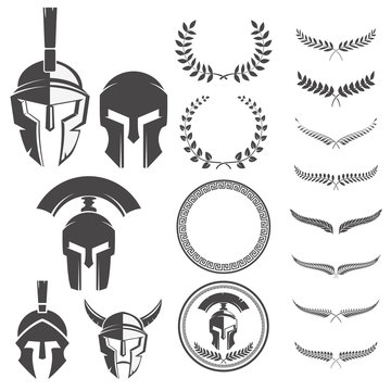 Naklejka Set of the spartan warriors helmets and design elements for embl