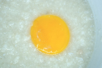 Rice porridge and yolk, no vegetable.