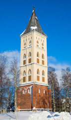 Fototapeta na wymiar Belfry of the Saint Mary Church on Kauppakatu Street. Lappeenranta. Finland