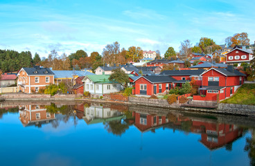 The River Porvoonjoki Bank with the wooden buildings in the Old Town. Autumn view. Porvoo. Finland.