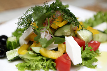 Greek salad on a white plate
