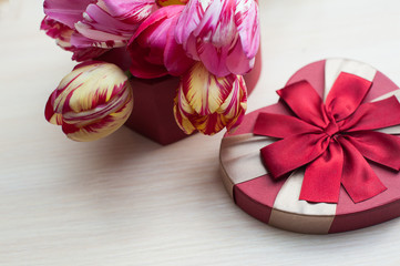 tulips and red box for gift in form of heart