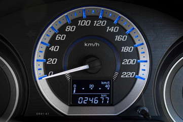 detail with the gauges on the dashboard of a car
