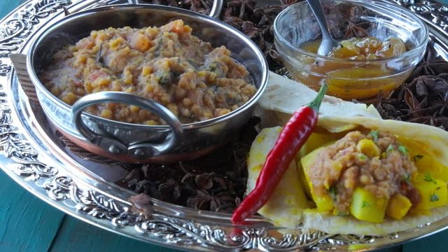 Indian woman serve Masala dosa dish 4K.