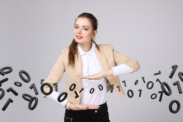Woman working with binary code, concept of digital technology.