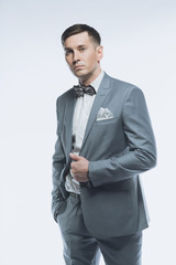 Portrait of a elegant handsome business man on white background