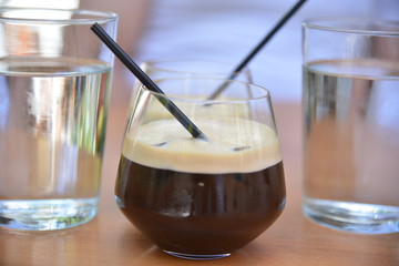 Freddo instant coffee on ice cubes Greek summer drink