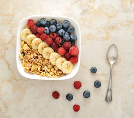 healthy Breakfast - cereal with blueberries, raspberries and ban