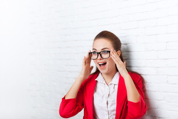 Businesswoman excited wear red jacket glasses happy smiling