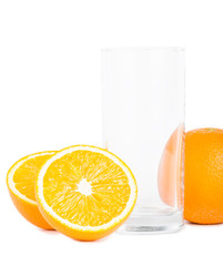 Isolated empty glass with oranges