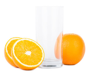 Isolated empty glass with oranges