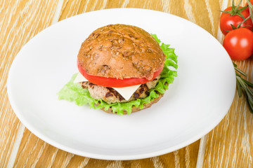 Burger on white plate