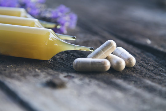 natural medicine products on wooden background