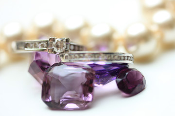 Diamond rings on gemstones
