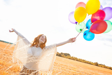 Frau mit Luftballons 