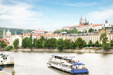 Obraz premium Tourist boat on the river