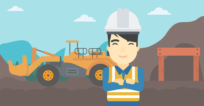 Miner with mining equipment on background.