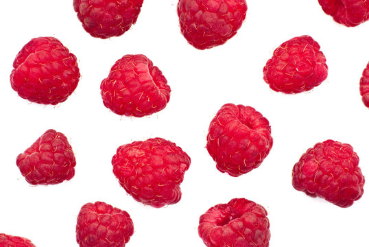 Isolated juicy raspberries on a white background