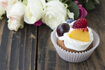 Delicious Cupcake with Fruits and Flowers