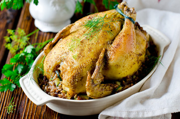 Baked chicken stuffed with buckwheat and zucchini