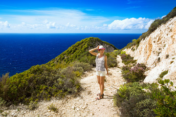 Traveler on the Background Incredible Navagio Beach or Shipwreck Beach. Zakynthos, Greece.